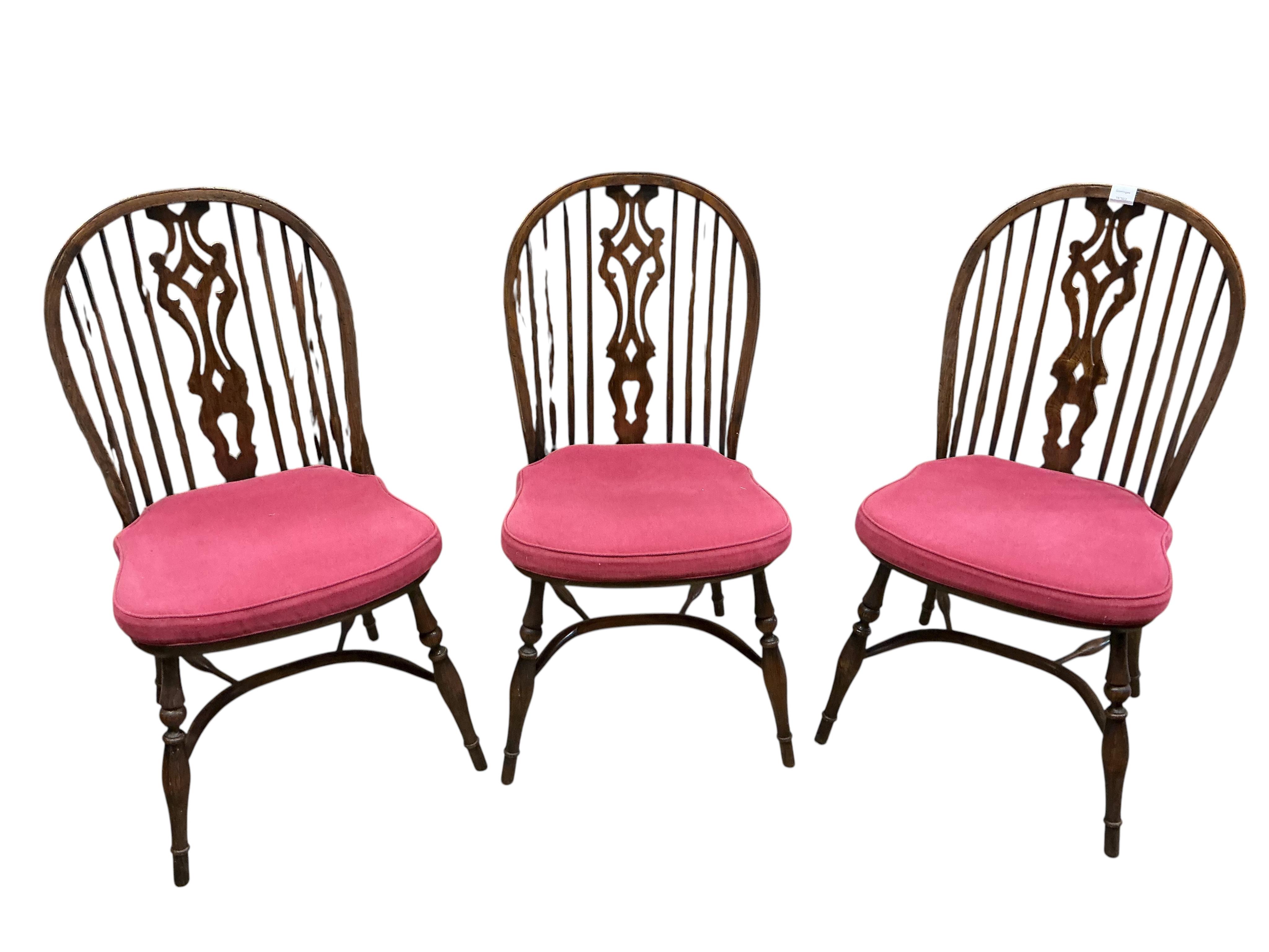 A set of six reproduction ash and elm Windsor dining chairs with crinoline stretchers, width 48cm, depth 46cm, height 99cm